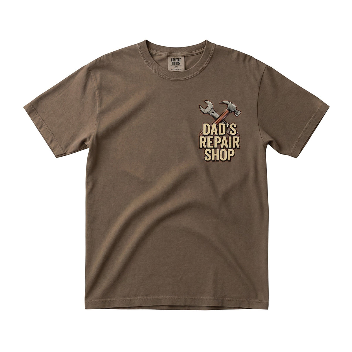 brown short sleeve crew neck t-shirt with Dad's Repair Shop hammer and wrench graphic on the chest