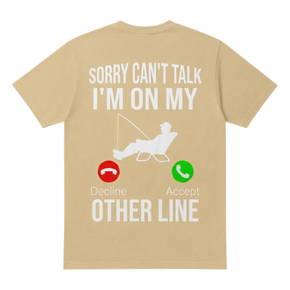  beige cotton t-shirt with Sorry can't talk I'm on my other line fishing graphic on the back