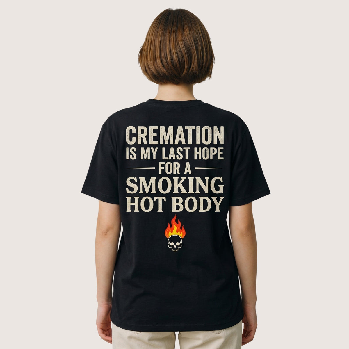  black unisex cotton t-shirt with back graphic print featuring a skull, flame, and dark humor quote.