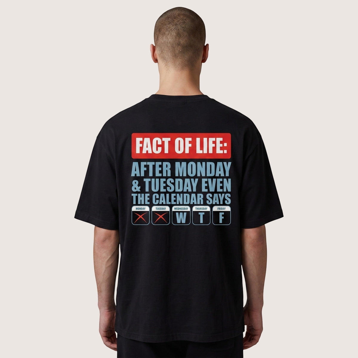  black heavyweight cotton t-shirt with a humorous calendar graphic print on the back