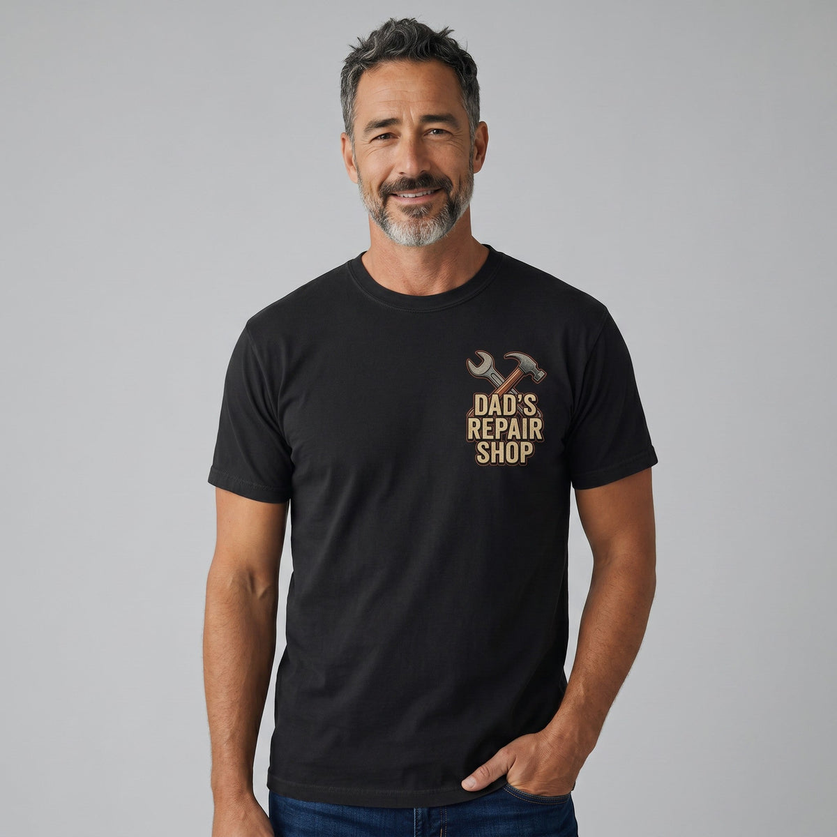  black crew neck t-shirt featuring a Dad's Repair Shop graphic on a smiling man