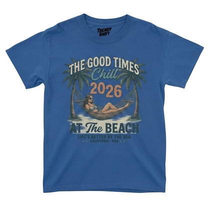  blue graphic t-shirt featuring a retro beach scene with a woman in a hammock and palm trees.