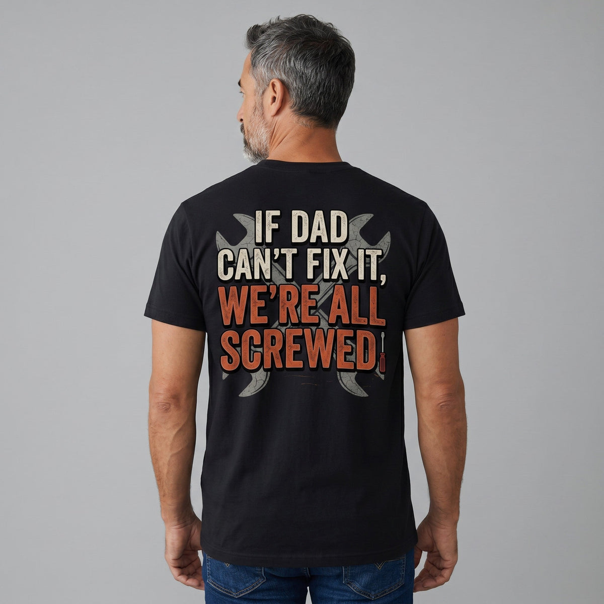  black unisex crew neck t-shirt with Dad's Repair Shop graphic on back worn by a man from behind
