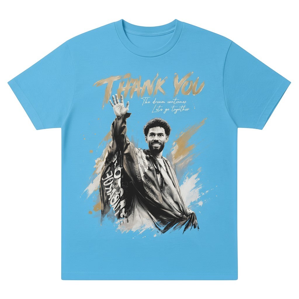  light blue oversized cotton tee featuring a graphic print of a goalkeeper waving goodbye.