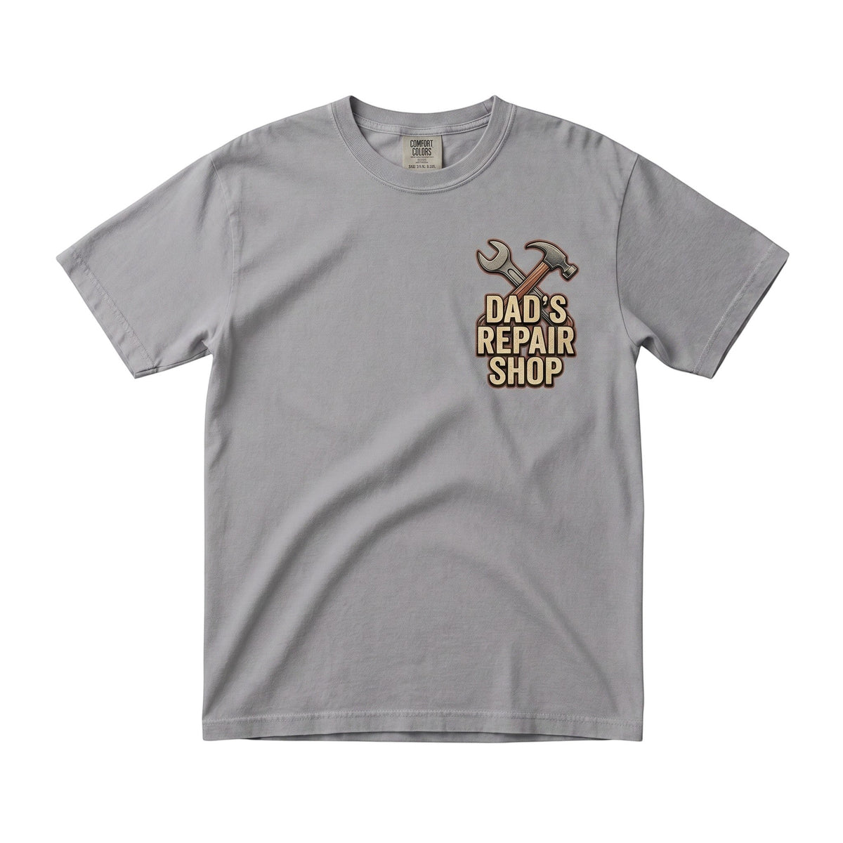  grey crew neck t-shirt featuring a Dad's Repair Shop graphic with a hammer and wrench on the chest.