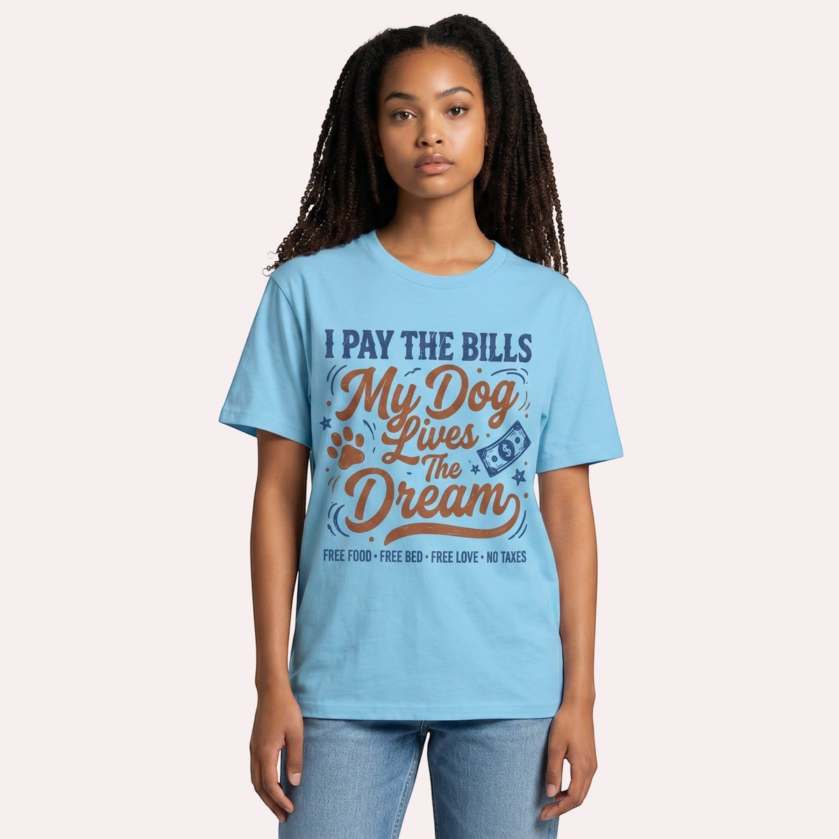  light blue cotton graphic t-shirt with I Pay The Bills My Dog Lives The Dream text on a model