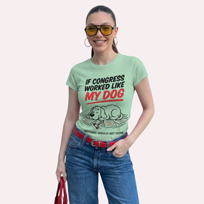  light green graphic t-shirt featuring a sleepy dog and political humor text on a smiling woman.