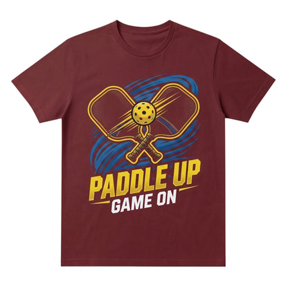  maroon unisex cotton t-shirt featuring a Paddle Up Game On pickleball graphic print.