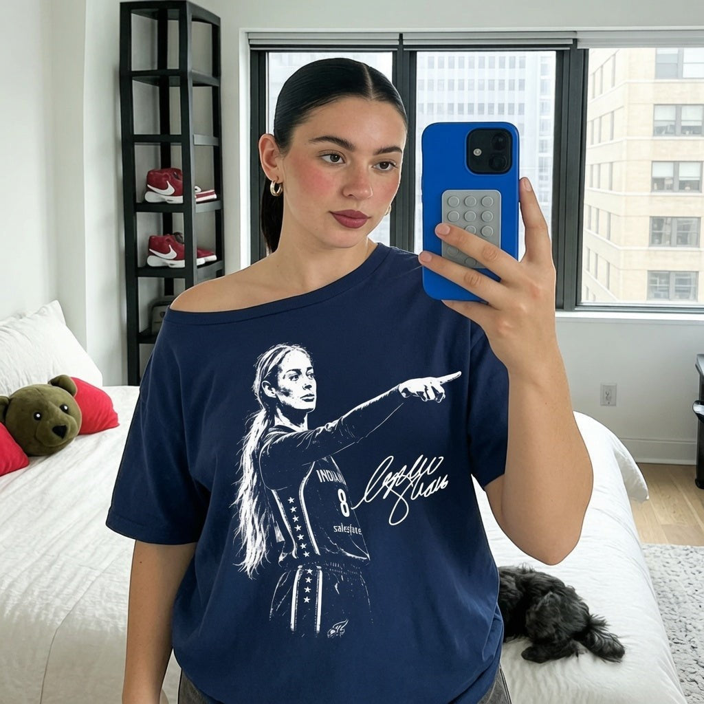  navy blue off-the-shoulder t-shirt featuring a graphic of a female basketball player pointing