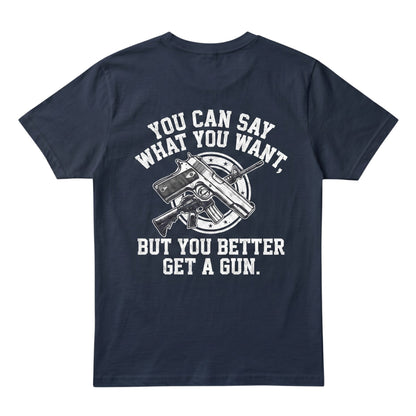  navy blue cotton t-shirt featuring a white graphic print of crossed firearms and bold text on the back