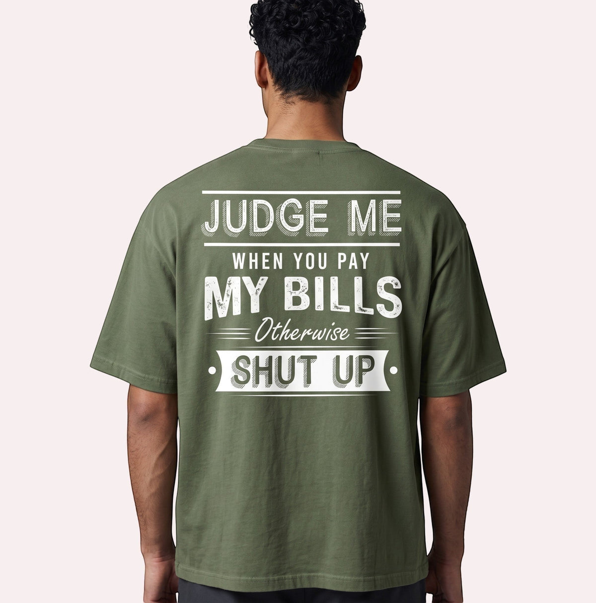  olive green oversized cotton graphic tee with distressed white back print text on a male model