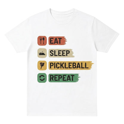  white cotton unisex t-shirt featuring an Eat Sleep Pickleball Repeat graphic print design.