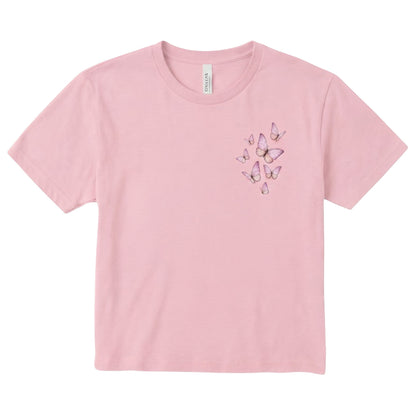  light pink cropped crewneck t-shirt with a delicate butterfly graphic on the chest.