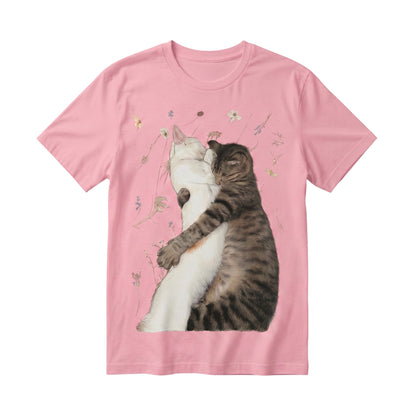  pink cotton t-shirt featuring a graphic illustration of a white cat and tabby cat hugging.