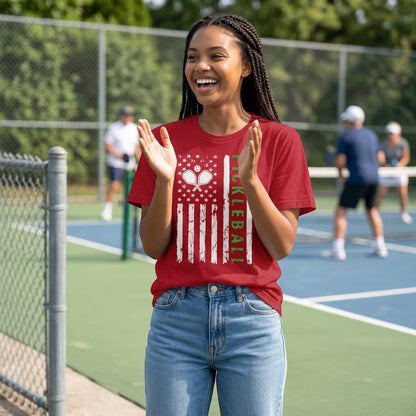  red pickleball jersey tee with American flag graphic on a woman at a pickleball court
