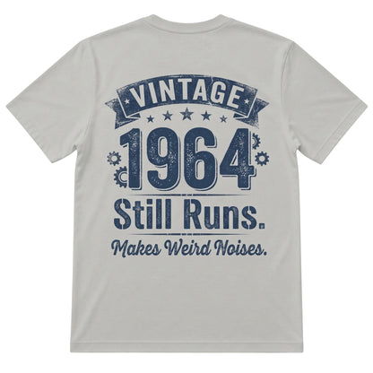  grey 100% cotton t-shirt with Vintage 1964 Still Runs Makes Weird Noises graphic on the back