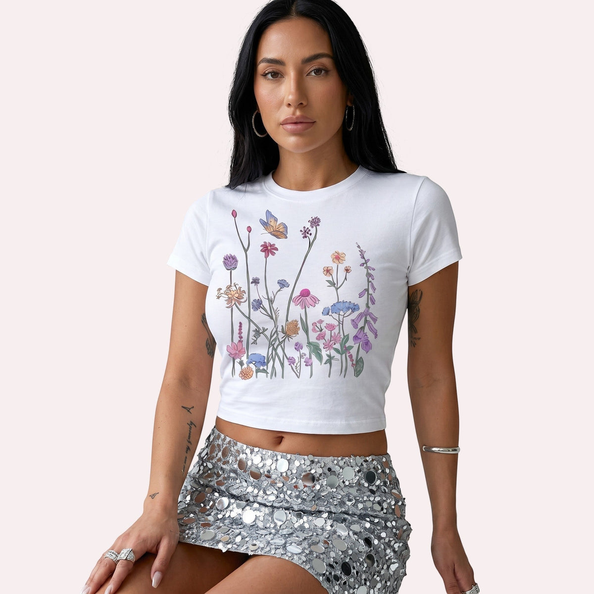  white micro rib crop tee featuring a colorful wildflower and butterfly graphic print.