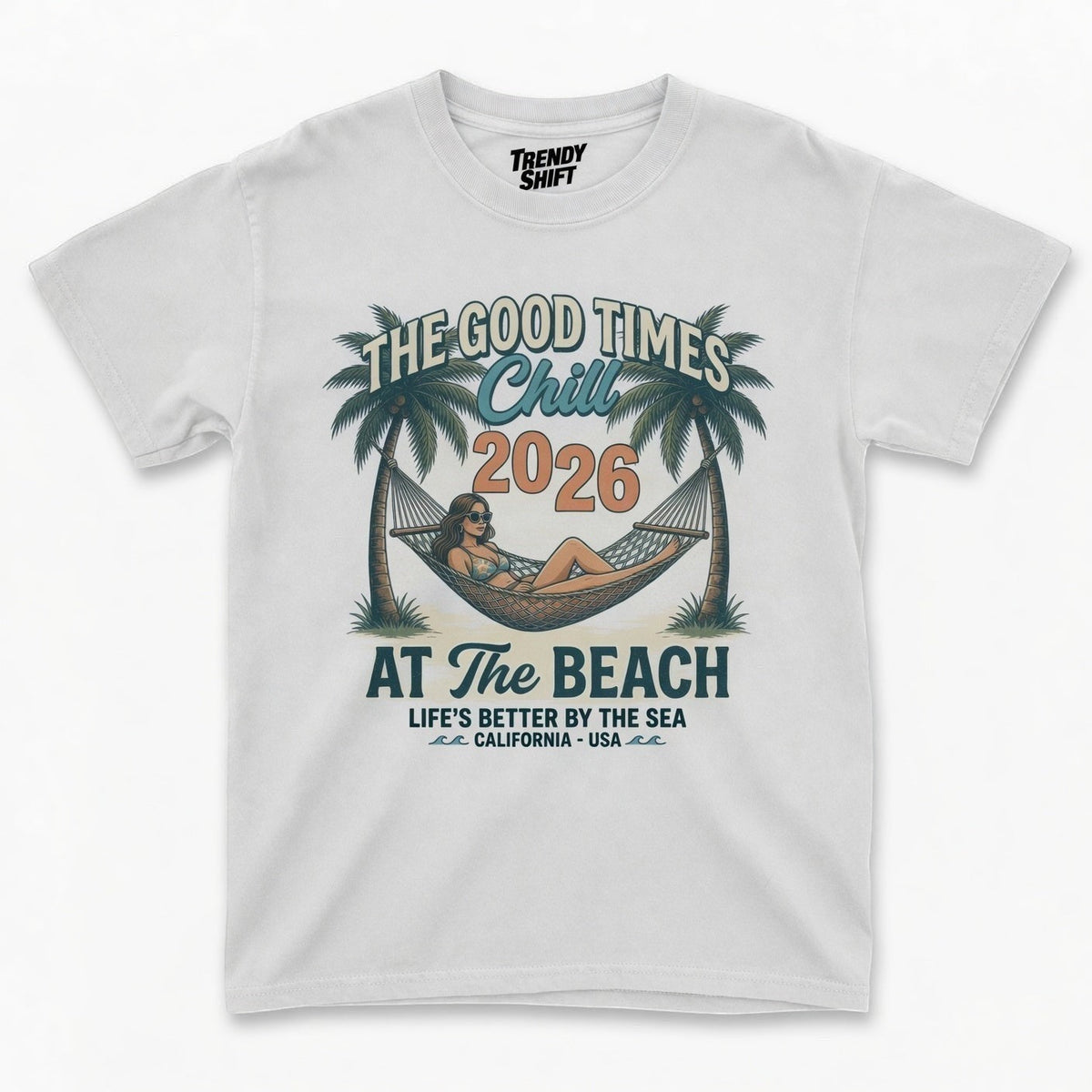  white graphic t-shirt featuring a retro beach scene with a woman in a hammock and palm trees.