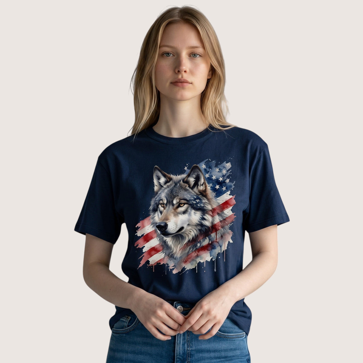  black t-shirt featuring a watercolor wolf and American flag graphic worn by a blonde woman