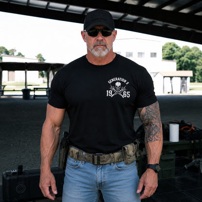  black cotton t-shirt with Generation X 1965 skull graphic worn by a man in a tactical setting