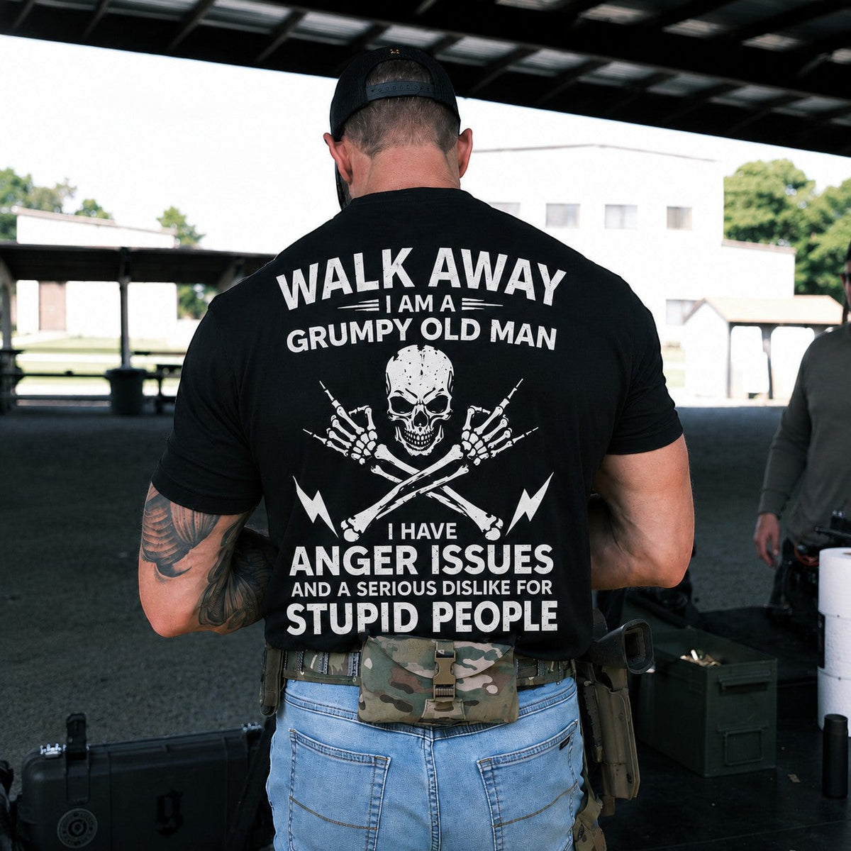  black cotton t-shirt with Grumpy Old Man skull graphic and humorous text on the back